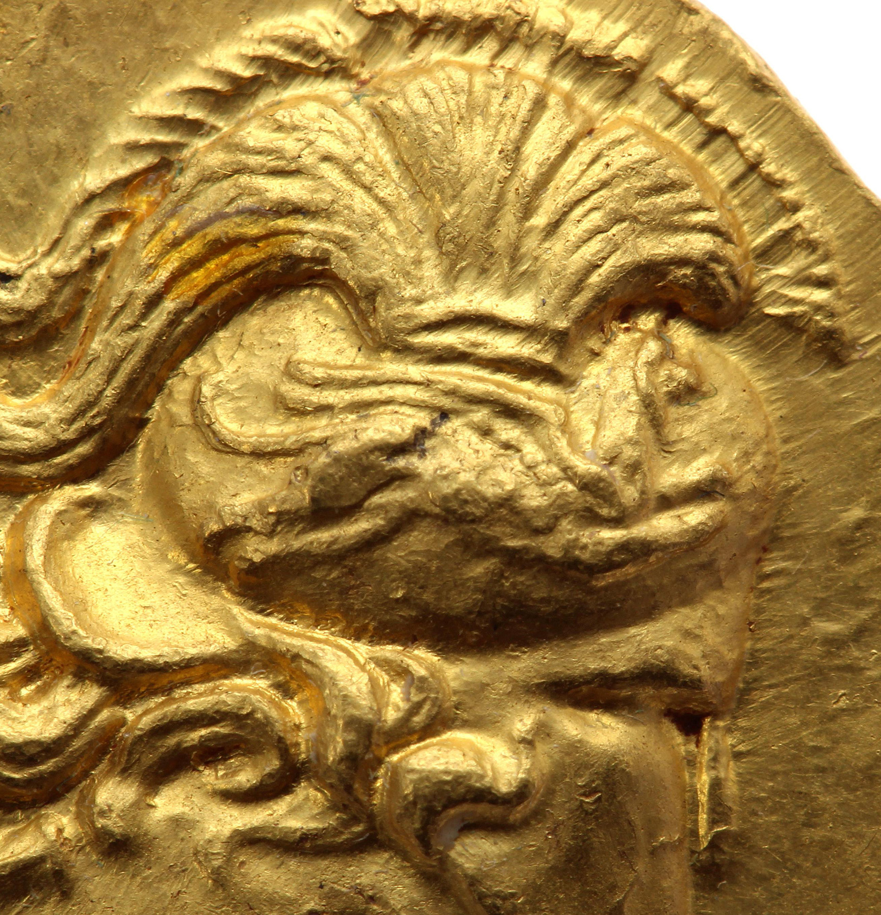 Corinthian helmet, which is decorated with a magnificent plume