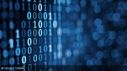Blue digital binary data on computer screen