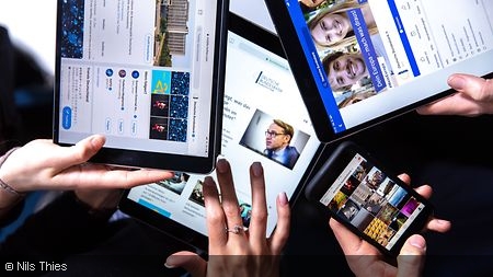 Tablets and smartphones with social media profiles
